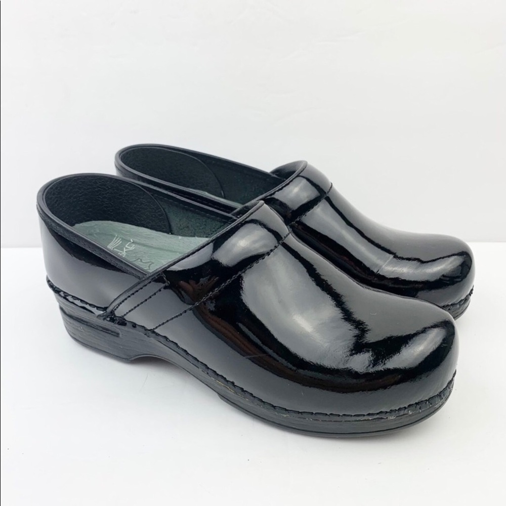 Dansko | Black Patent Leather Wedge Heel Clogs